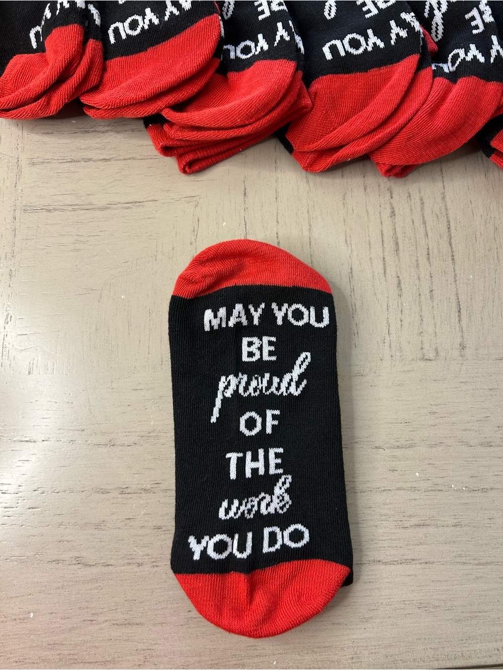 8 pairs of novelty crew socks. Soft and Comfortable Black with Red Accents